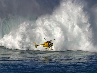 Helicopter Hovers In Front Of Surf Crashing On Mauis Northshore At Peahi, Hawaii by David B. Fleetham Pricing Limited Edition Print image