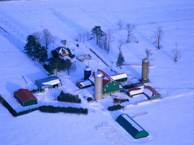 Farm Yard And Buildings Blanketed In Heavy Snow, Near Stratford, Ontario, Canada by Jim Wark Pricing Limited Edition Print image