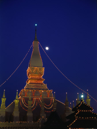 Lit Up Pha That Luang Stupa At Night, Vientiane, Laos by Joe Cummings Pricing Limited Edition Print image