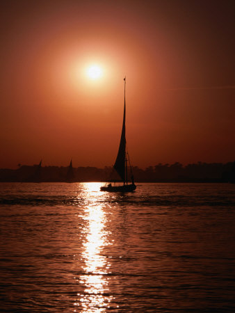 Felucca On Nile River At Sunset, Luxor, Egypt by Cheryl Conlon Pricing Limited Edition Print image