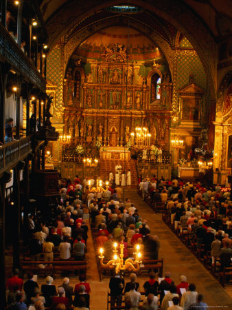 Congregation Facing Gilded Altarpiece In Eglise St-Jean Baptiste, French Basque Church, France by Bill Wassman Pricing Limited Edition Print image