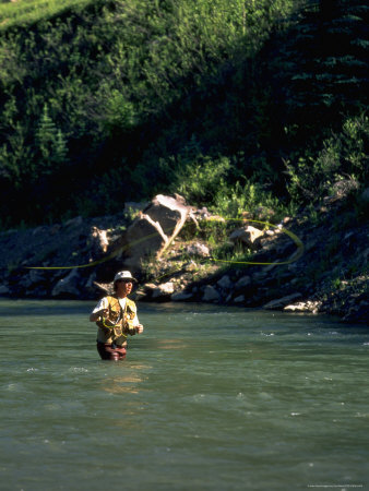 Man In Fishing Hat Fly-Fishing by Ted Wilcox Pricing Limited Edition Print image