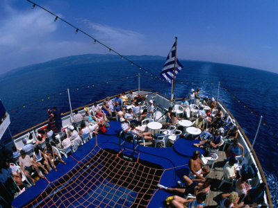 Passengers On The Deck Of A Ferry At Sea, Greece by Jon Davison Pricing Limited Edition Print image
