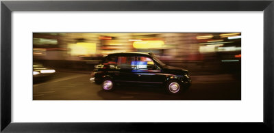 Black Cab In The Night, London, England by Panoramic Images Pricing Limited Edition Print image