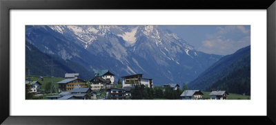 Village On A Landscape And A Mountain Range In The Background, St. Anton, Austria by Panoramic Images Pricing Limited Edition Print image