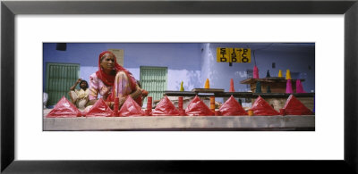 Mature Woman Sitting With Powdered Colors, Pushkar, Rajasthan, India by Panoramic Images Pricing Limited Edition Print image
