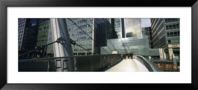 Bridge In Front Of Buildings, Canary Wharf, London, England by Panoramic Images Pricing Limited Edition Print image
