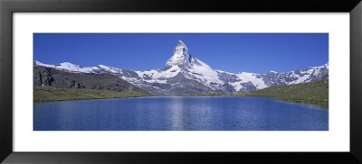 Panoramic View Of A Snow Covered Mountain By A Lake, Matterhorn, Zermatt, Switzerland by Panoramic Images Pricing Limited Edition Print image