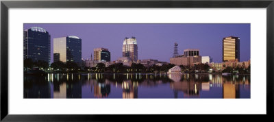 Office Buildings Along The Lake, Lake Eola, Orlando, Florida, Usa by Panoramic Images Pricing Limited Edition Print image