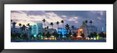 Buildings Lit Up At Dusk, Ocean Drive, Miami Beach, Florida, Usa by Panoramic Images Pricing Limited Edition Print image