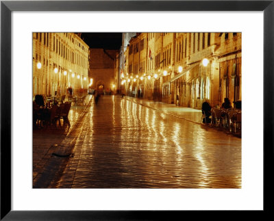 People Sitting At Tables On Placa At Night, Dubrovnik, Croatia by Richard Nebesky Pricing Limited Edition Print image