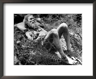 Indian Fakir Sleeping On A Bed Of Thorns As He Shuns Pain While Practicing His Religious Asceticism by Margaret Bourke-White Pricing Limited Edition Print image