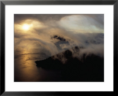 Clouds Sweeping Down Into The Caldera At Sunrise, Crater Lake National Park, Usa by Ryan Fox Pricing Limited Edition Print image