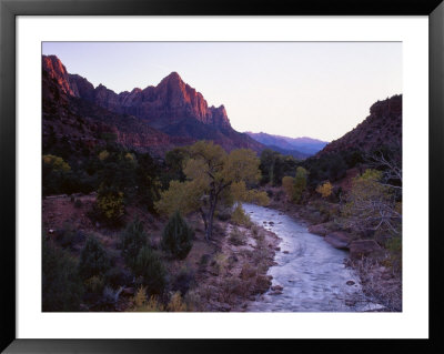 The Watchman Looms Over The Virgin River At Sunset, Zion National Park, Utah, Usa by Howie Garber Pricing Limited Edition Print image
