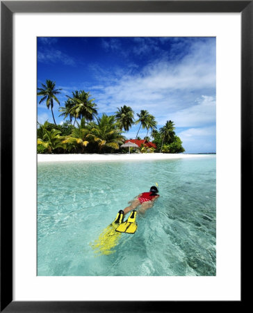 Woman Snorkelling, Kurumba Island, North Male Atoll, Kaafu, Maldives by Felix Hug Pricing Limited Edition Print image