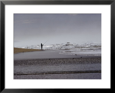 A Fisherman Casts His Line Into The Surf by Marc Moritsch Pricing Limited Edition Print image