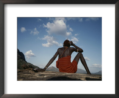 A Samburu Goatherd Takes A Break On The Top Of A Hill by Bobby Model Pricing Limited Edition Print image
