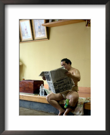 Sumo Wrestler Reading Newspaper, Tokyo City, Honshu Island, Japan by Christian Kober Pricing Limited Edition Print image