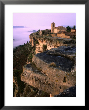 Morning Fog Below Village Chuch Close To Edge Of Rock Cliff, Siurana, Catalonia, Spain by Anders Blomqvist Pricing Limited Edition Print image