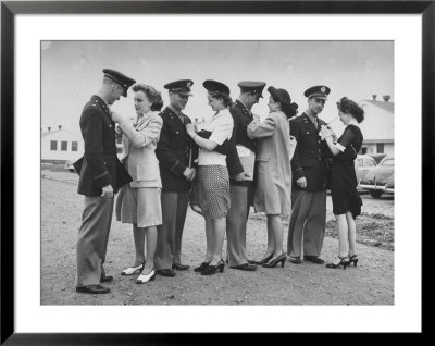 Women Pinning Wings Onto Four Air Force Cadets At Foster Field by Dmitri Kessel Pricing Limited Edition Print image