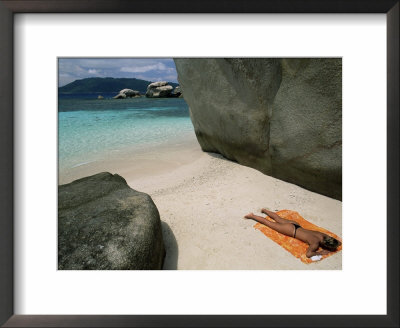 Woman Sunbathing On Beach Beween Rocks, Coco Island, Praslin, Seychelles, Indian Ocean, Africa by Bruno Barbier Pricing Limited Edition Print image