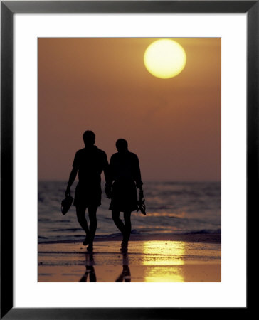 Couple Walking On Beach At Sunset, Sarasota, Florida, Usa by Maresa Pryor Pricing Limited Edition Print image