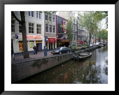 Red Light District Along One Of The City Canals, Amsterdam, The Netherlands (Holland) by Richard Nebesky Pricing Limited Edition Print image