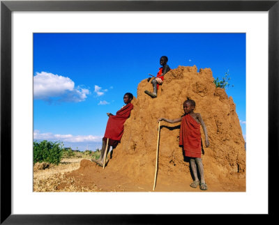 Three Young Maasai Goat Herds On A Termite Mound, Longido, Arusha, Tanzania by Ariadne Van Zandbergen Pricing Limited Edition Print image