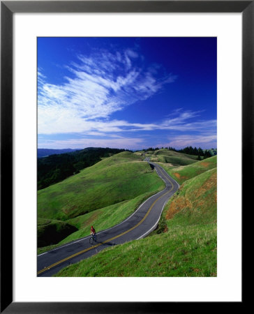 Bicycle Rider On Long And Winding Road, Mount Tamalpais, California, Usa by Thomas Winz Pricing Limited Edition Print image