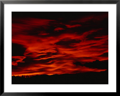 An Early Morning Sunrise Paints The Sky Red by Paul Nicklen Pricing Limited Edition Print image