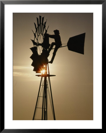 A Man Climbs A Windmill To Make Adjustments by Annie Griffiths Belt Pricing Limited Edition Print image