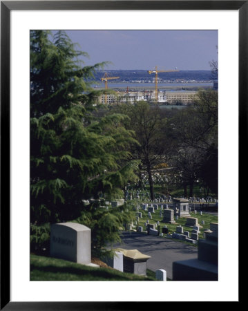 The Pentagon Looms Behind Arlington National Cemetery by Raymond Gehman Pricing Limited Edition Print image