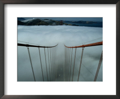 Cables Of The Golden Gate Bridge Stand Above The Early Morning Fog by Randy Olson Pricing Limited Edition Print image