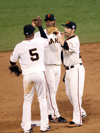 Texas Rangers V San Francisco Giants, Game 2: Juan Uribe, Edgar Renteria, Freddy Sanchez by Ezra Shaw Pricing Limited Edition Print image