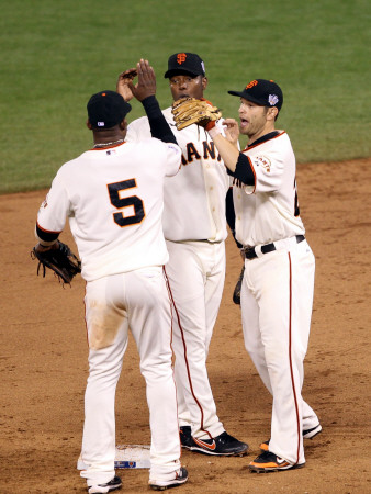 Texas Rangers V San Francisco Giants, Game 2: Juan Uribe, Edgar Renteria, Freddy Sanchez by Ezra Shaw Pricing Limited Edition Print image