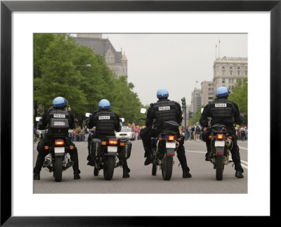 Police Officers Stand Sentinel Before A Crowd by Jim Webb Pricing Limited Edition Print image