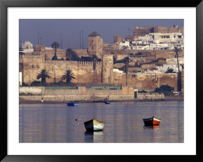 Fishing Boats With 17Th Century Kasbah Des Oudaias, Morocco by John & Lisa Merrill Pricing Limited Edition Print image
