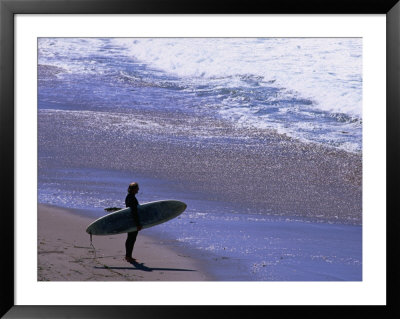 Surfer On The Malibu Shore, Los Angeles, California, Usa by Ray Laskowitz Pricing Limited Edition Print image