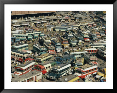 Buses Fill A Parking Lot by Joe Scherschel Pricing Limited Edition Print image