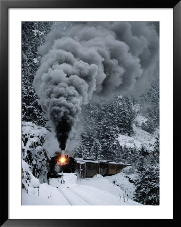 A Train Chugs Through The Snow Blanketing The San Juan Mountains by Paul Chesley Pricing Limited Edition Print image