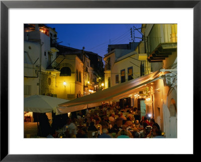 Crowded Outdoor Eateries In Old Town, Ibiza, Spain by Bill Wassman Pricing Limited Edition Print image