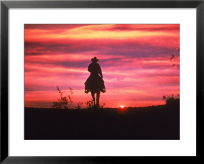 Silhouette Of Cowboy On Horse At Sunset by Ewing Galloway Pricing Limited Edition Print image