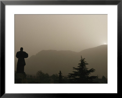 Silhouetted Statue Of Damo At The Entrance To Shaolin by Eightfish Pricing Limited Edition Print image