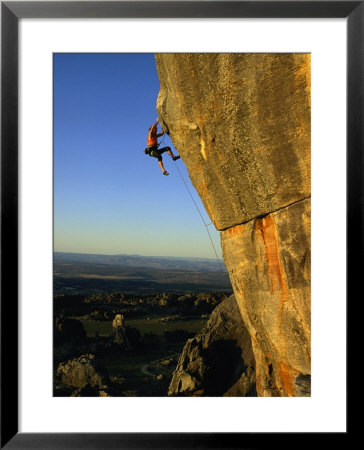 Todd Skinner Climbs A Large Rock Face At The Rocklands by Bill Hatcher Pricing Limited Edition Print image