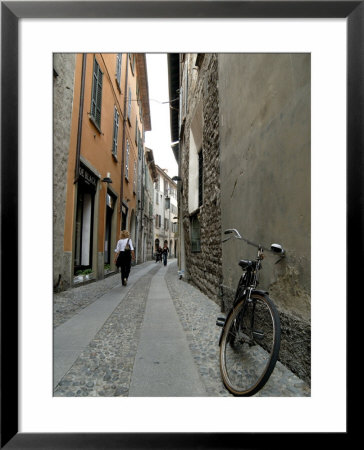 Narrow Street In Como, Lake Como, Italy by Lisa S. Engelbrecht Pricing Limited Edition Print image