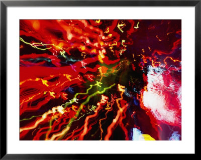 A Time Exposure Turns Neon Lights Into An Abstract Burst Of Colored Streaks by Stephen St. John Pricing Limited Edition Print image