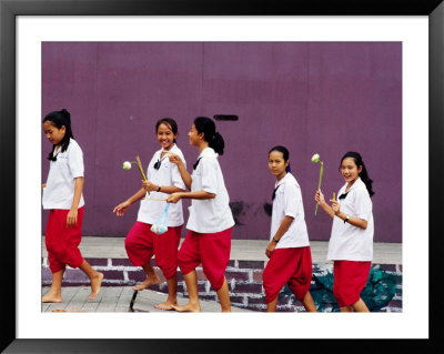 Group Of Girls In Wai Kru Ceremony At Fine Art College, Bangkok, Thailand by Alain Evrard Pricing Limited Edition Print image