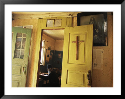 A Clergyman Studies Inside A 13Th-Century Orthodox Church by Randy Olson Pricing Limited Edition Print image