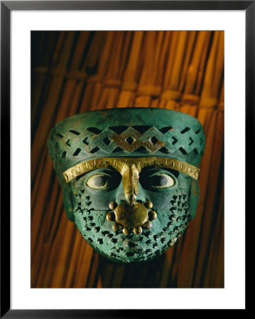 Gold-And-Copper Burial Mask Of The Moche Culture Found In The Tombs At Dos Cabezas by Kenneth Garrett Pricing Limited Edition Print image