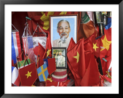 Vietnamese Flags And Portraits Of Ho Chi Minh In A Tourist Shop, Hanoi, Vietnam, Indochina by Andrew Mcconnell Pricing Limited Edition Print image